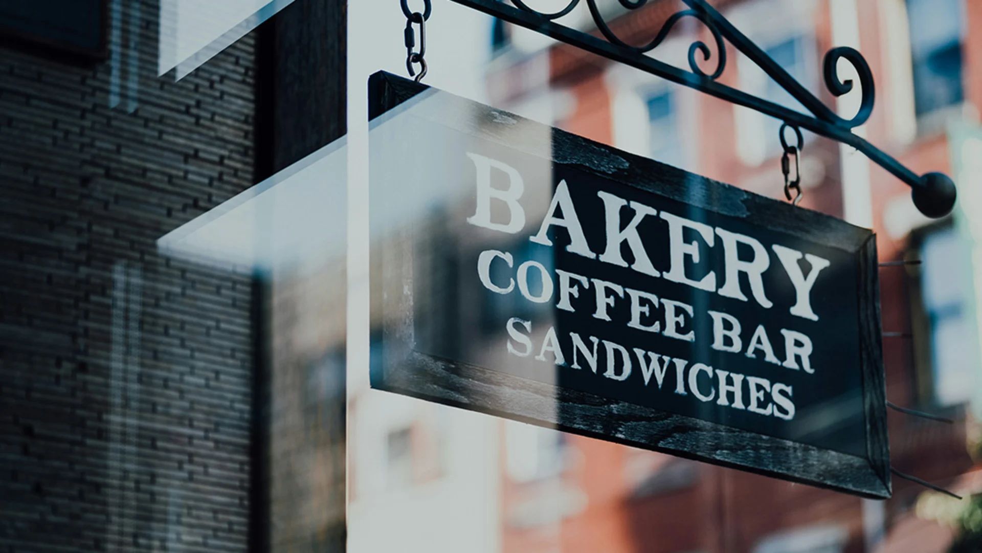 Westerra Credit Union small business member storefront sign displaying "Bakery, Coffee Bar, Sandwiches" – representing local businesses supported by Westerra small business line of credit.
