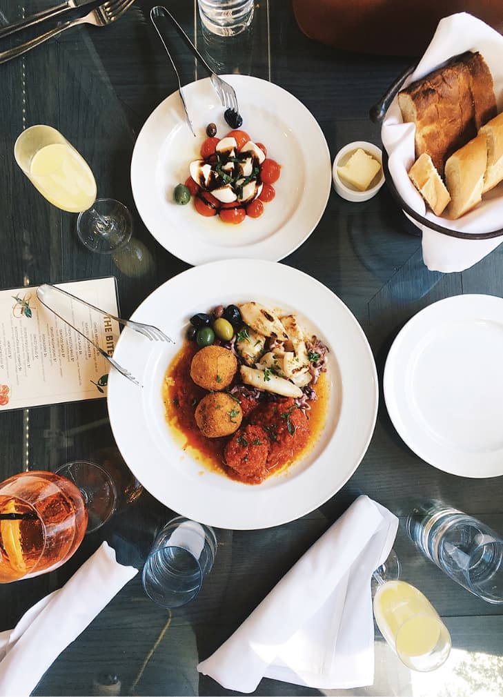 Overhead view of plates of food on a table
