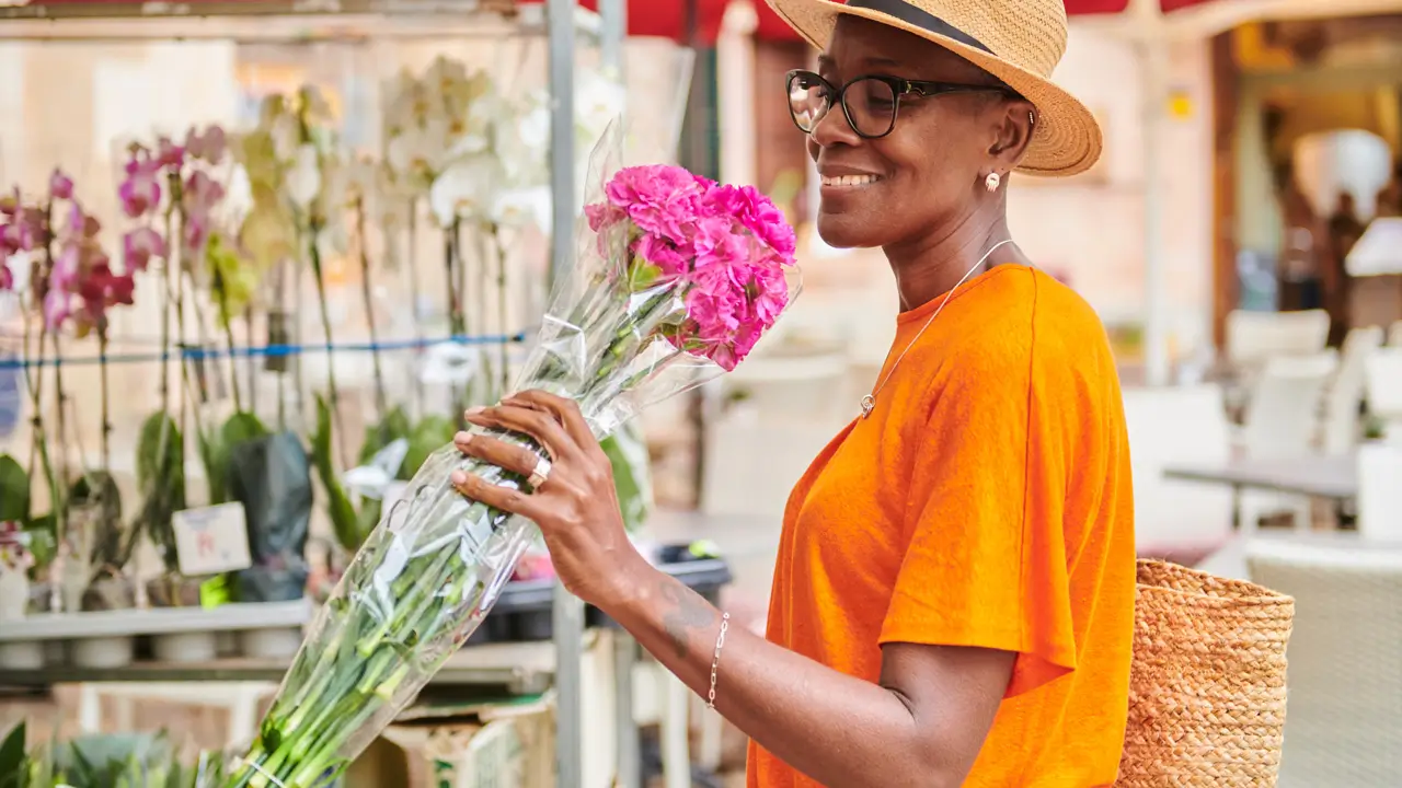 Woman smelling flowers