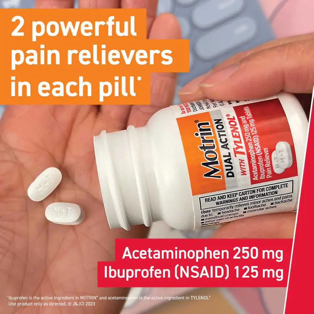 A hand holds a bottle of Motrin Dual Action with Tylenol. Two white, oval-shaped pills are visible in the foreground.