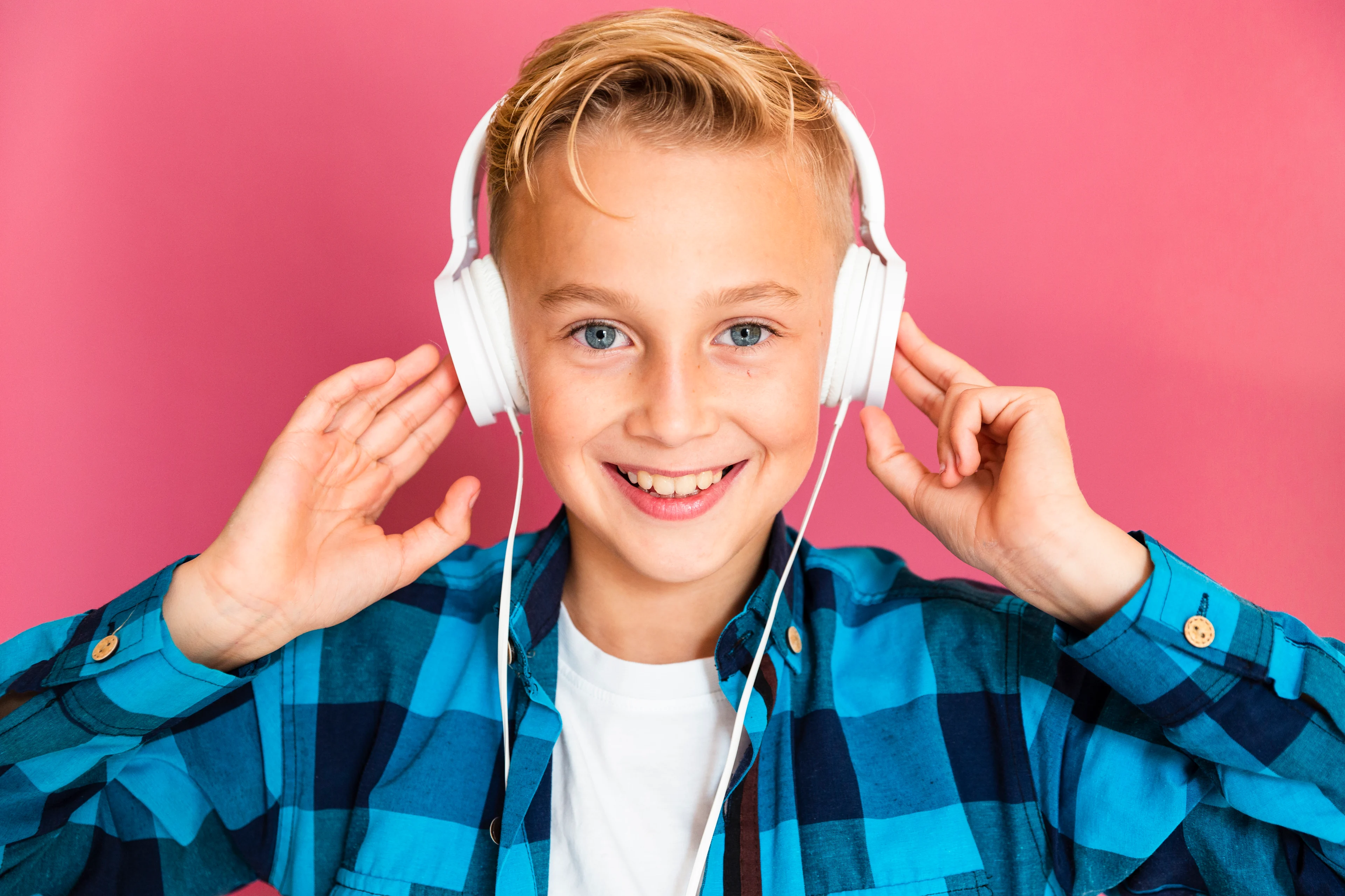 front-view-boy-listening-music-headphones