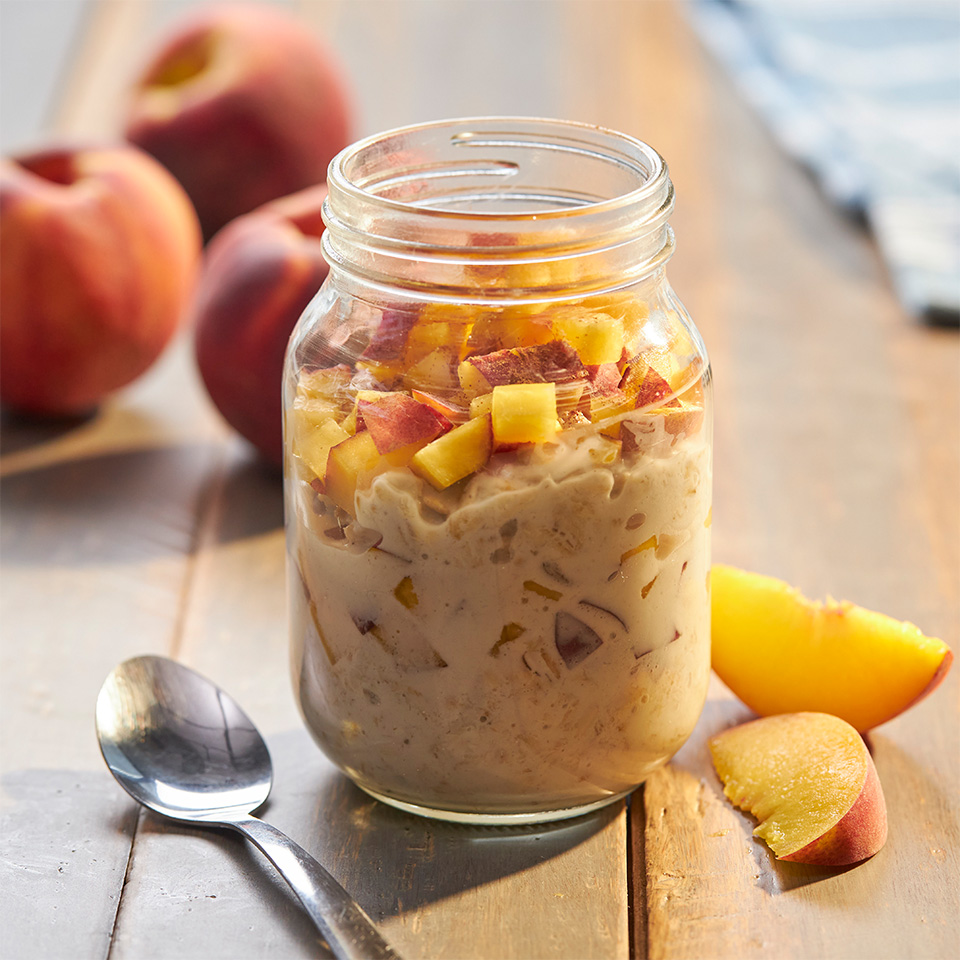 Nutty Peaches and Cream Overnight Oats in a Mason Jar