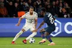Bayern Munich forward Michael Olise in action against PSG