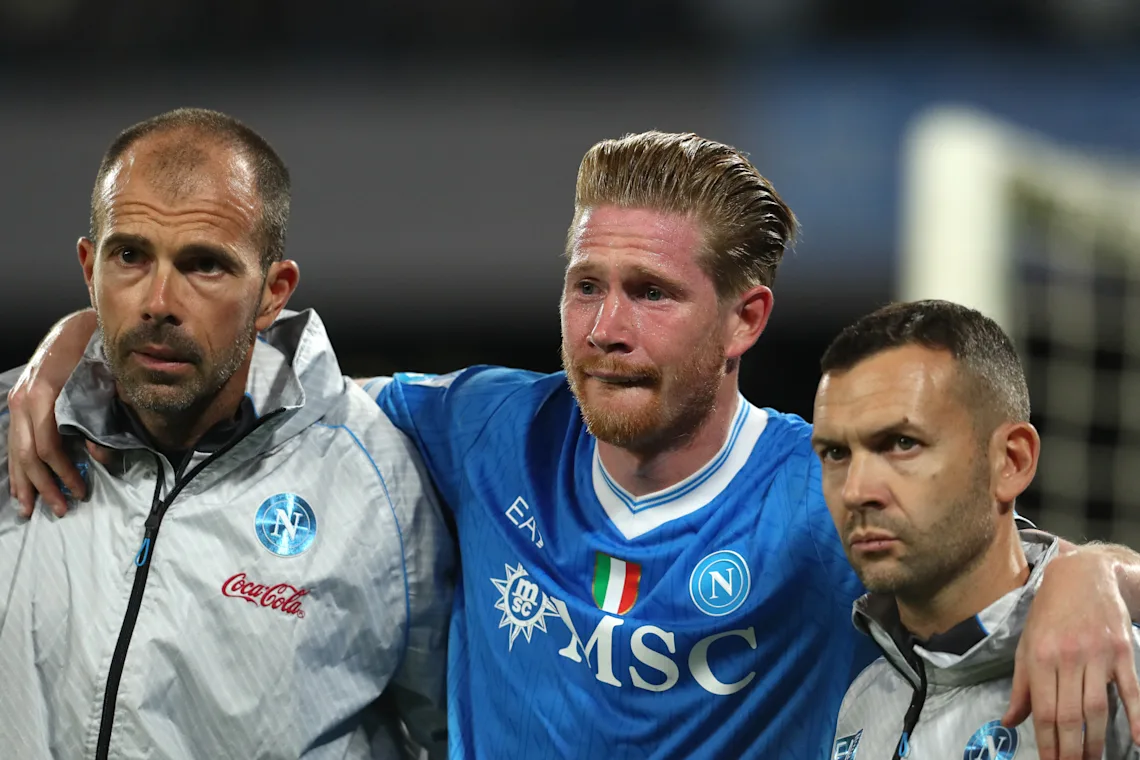 Kevin De Bruyne is helped off the pitch during Napoli's 3-1 win over Inter on Saturday night