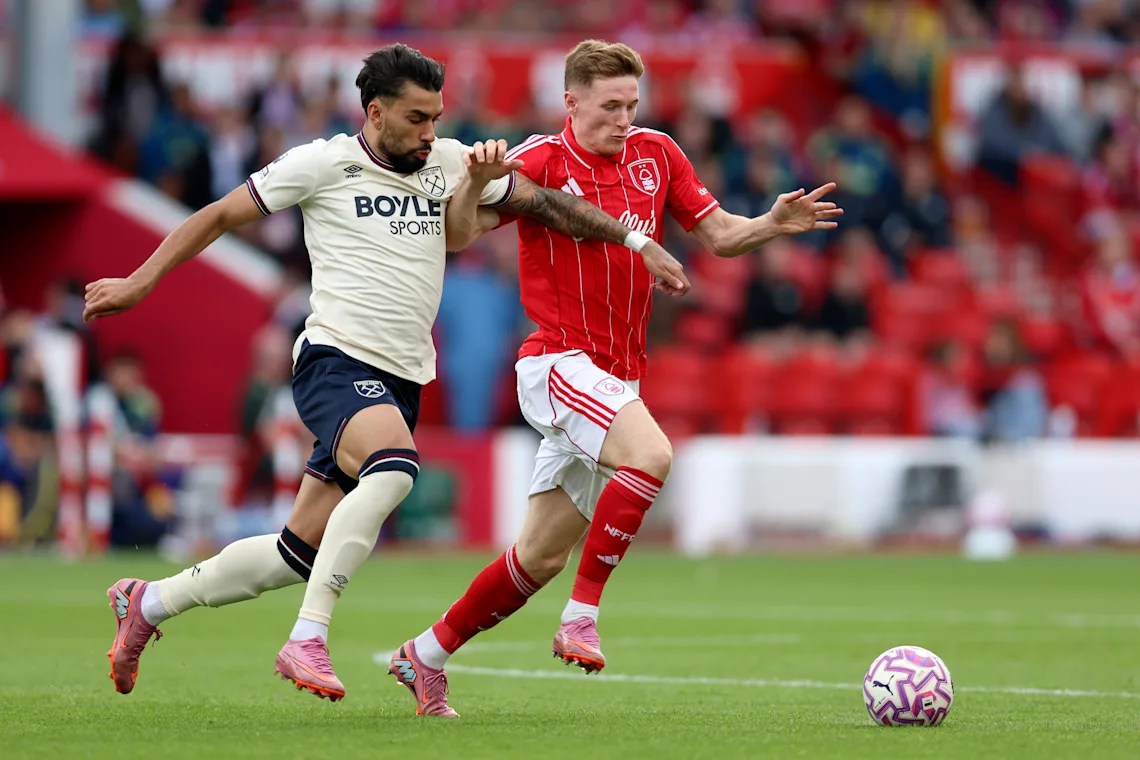 Lucas Paqueta and Elliot Anderson compete for possession