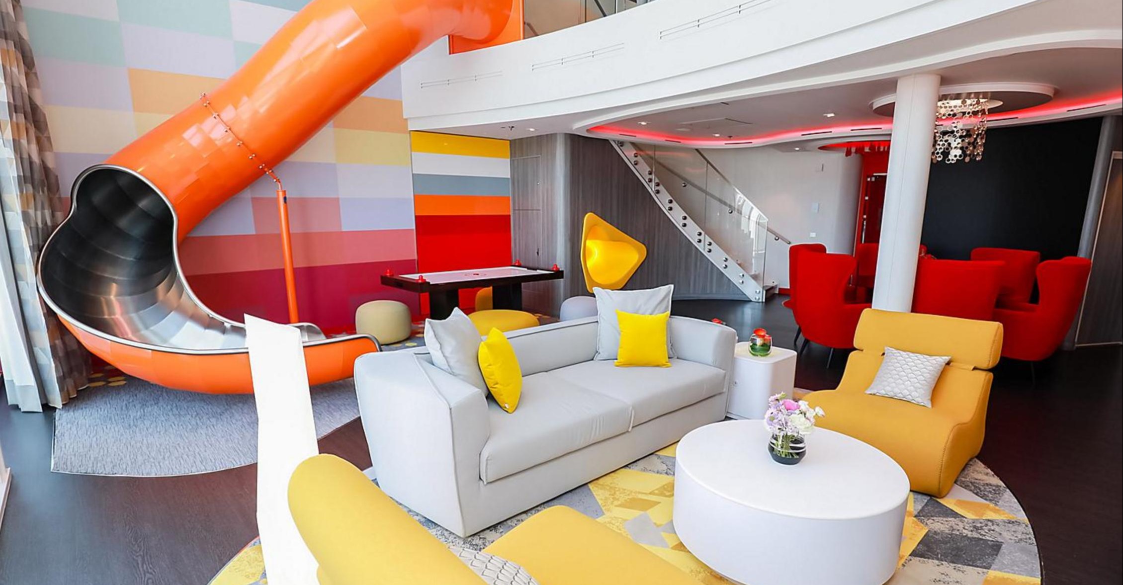 spectrum-of-the-seas-ultimate-family-suite-living-room-slide