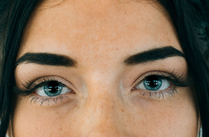 woman with dilated pupils