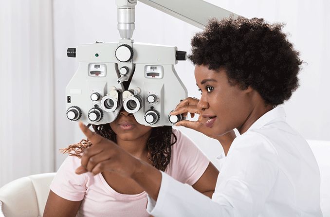 woman with high myopia getting an eye exam