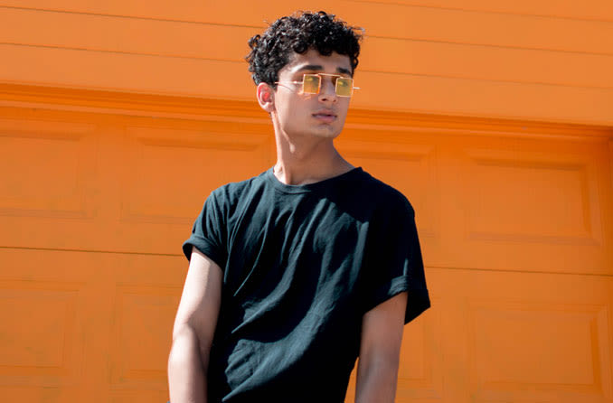 Teenager wearing sunglasses