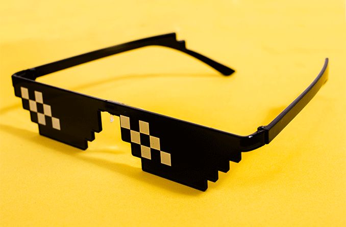 pair of mlg glasses on a yellow background