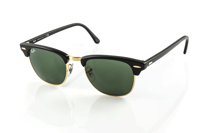 a pair of clubmaster sunglasses on a white background