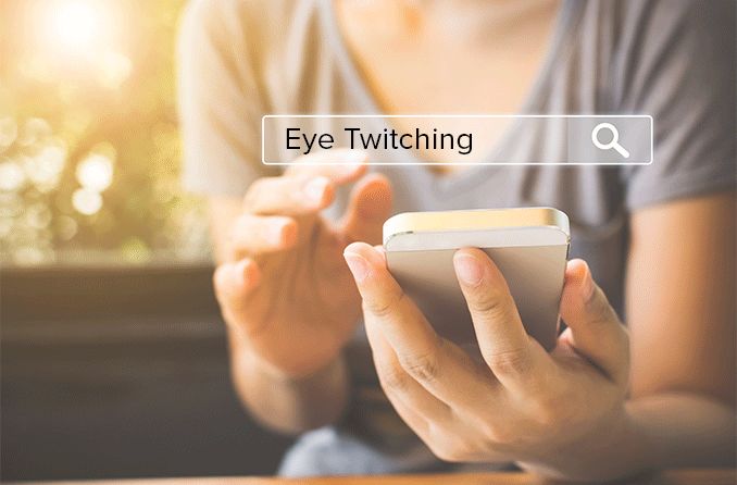 person doing an internet search on what eye twitching means