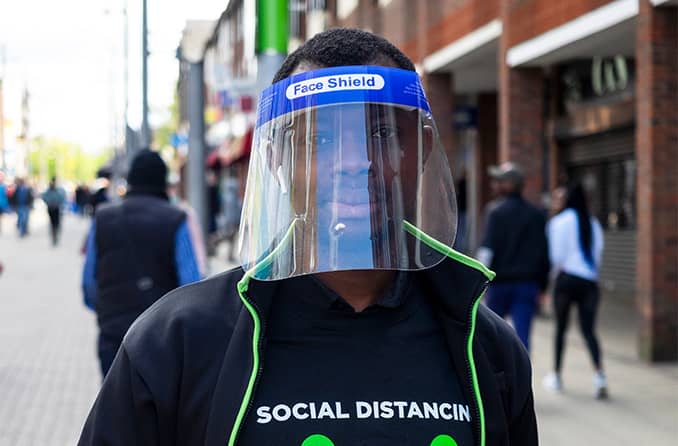 man wearing a face shield to protect from coronavirus