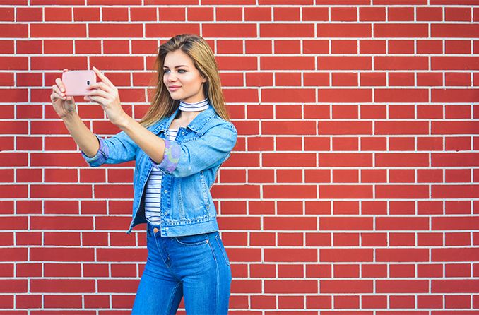 teen girl taking a selfie