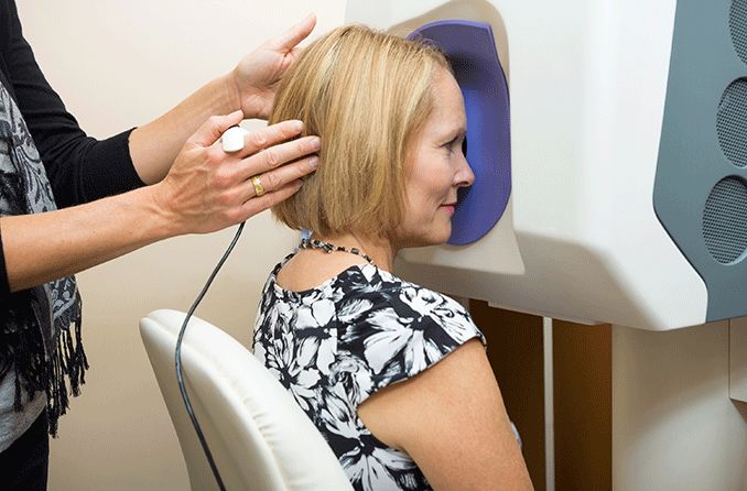 woman getting an optomap eye exam