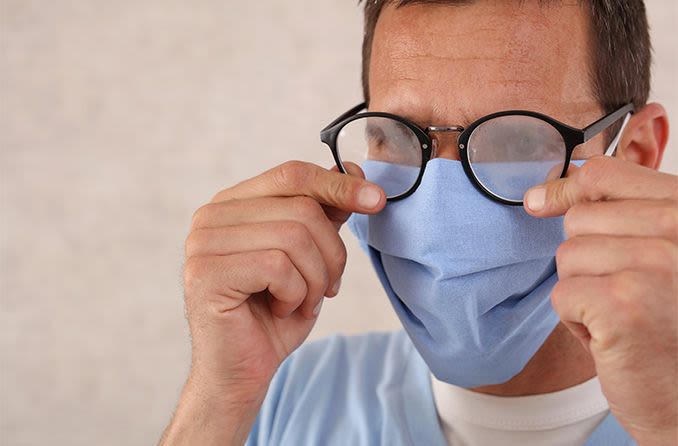 foggy glasses on a man wearing face mask