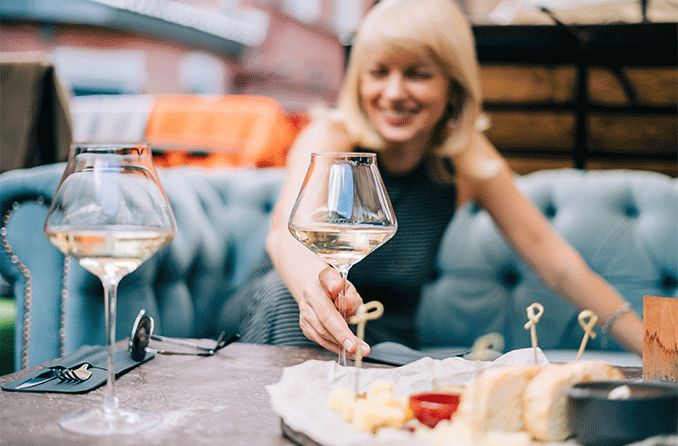 woman with alcohol on a blurry background