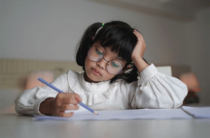 young girl wearing eyeglasses for myopia control