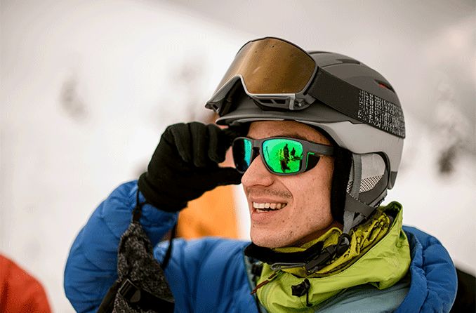 man wearing sunglasses for skiing