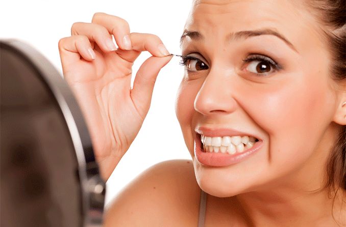 woman with trichotillomania pulling her eyelashes out