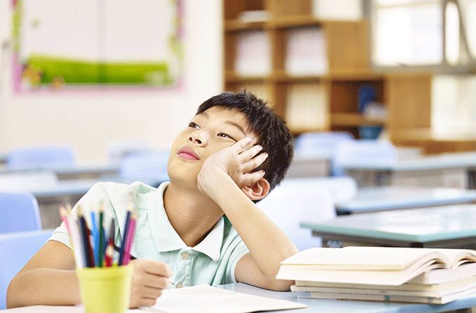 boy in classroom with ADHD