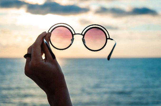 see the world through rose tinted glasses