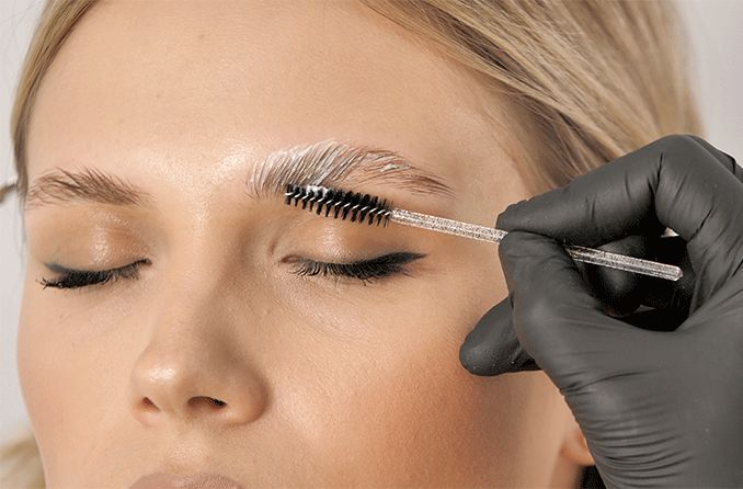 woman getting brow lamination procedure