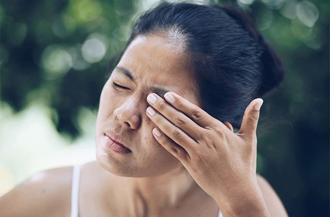 woman with glue in eye