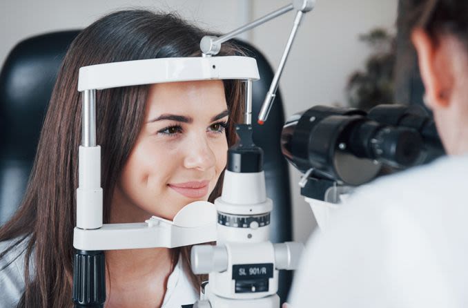 Woman having a glaucoma test eye exam