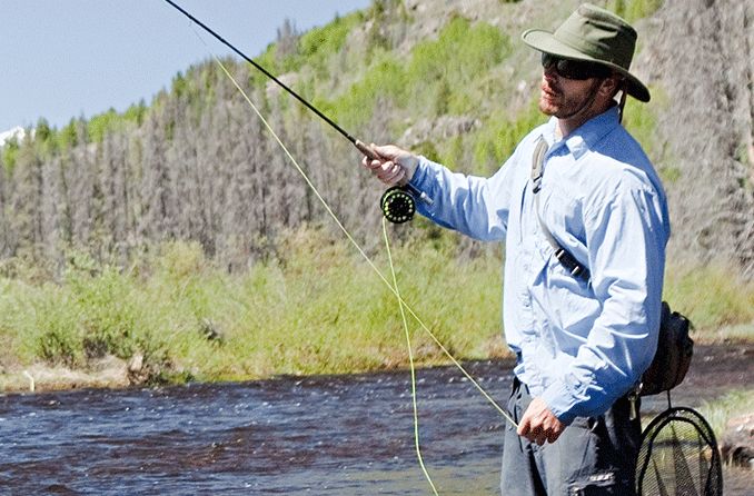 man wearing fishing sunglasses