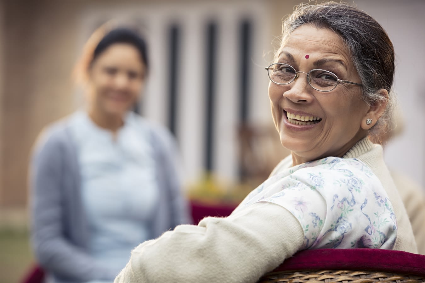 older hindi woman smiling 