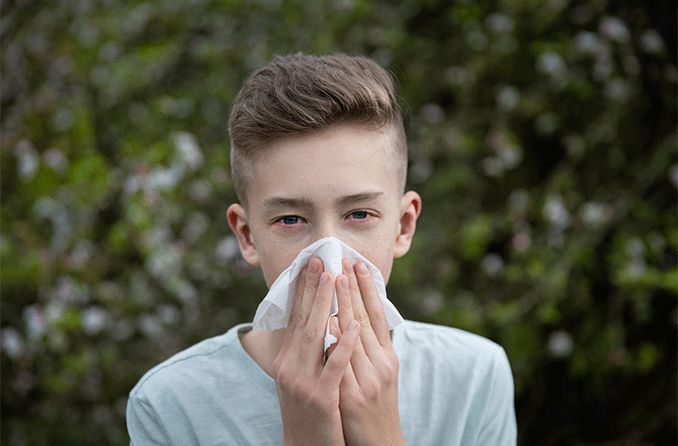 teen boy with allergic conjunctivitis