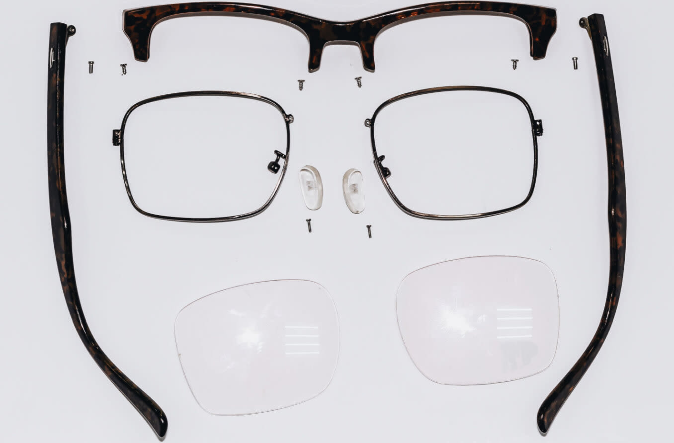 Eyeglass frame disassembled for parts.