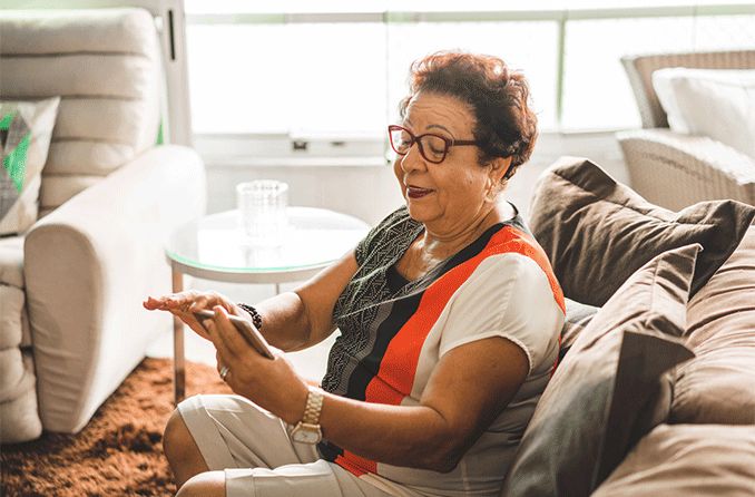 older woman looking at mobile phone