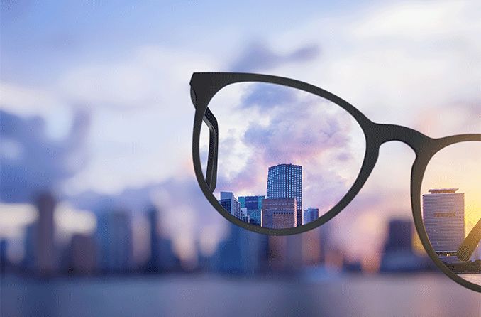 skyline with blurred background becoming clear with glasses