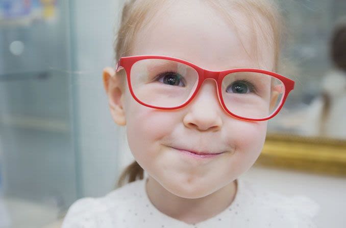 Girl with red glasses