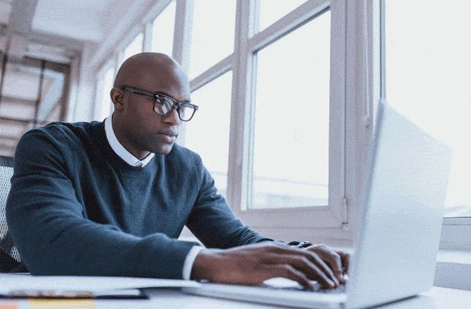 Man working on his laptop.