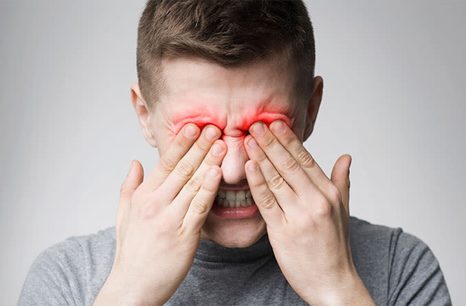 man with eyelid pain