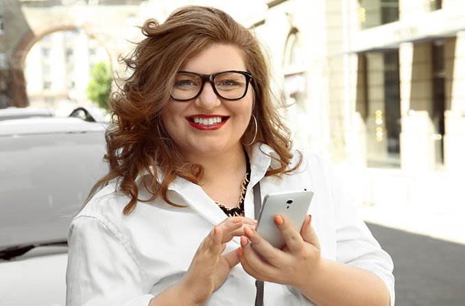 Woman wearing wayfarer eyeglasses