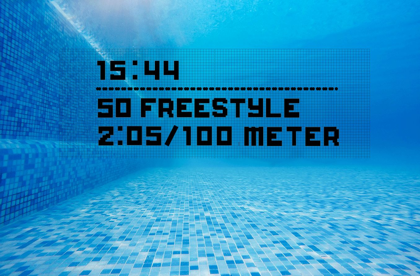 underwater view with smart swim goggles on showing text in view