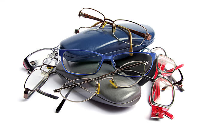 multiple colors and styles of reading glasses