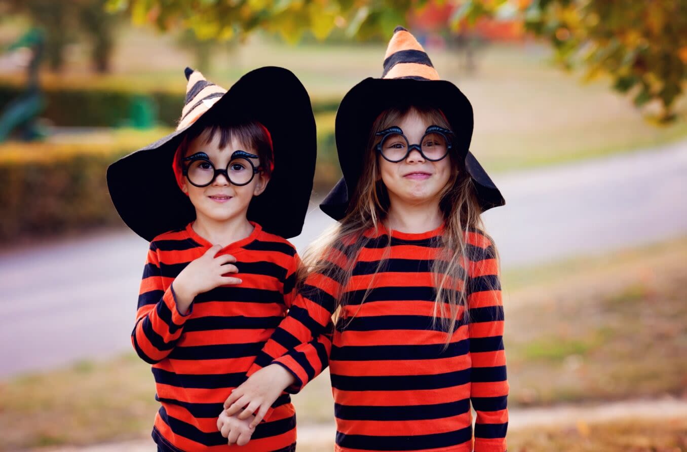 Children wearing glasses as a part of their Halloween costumes.