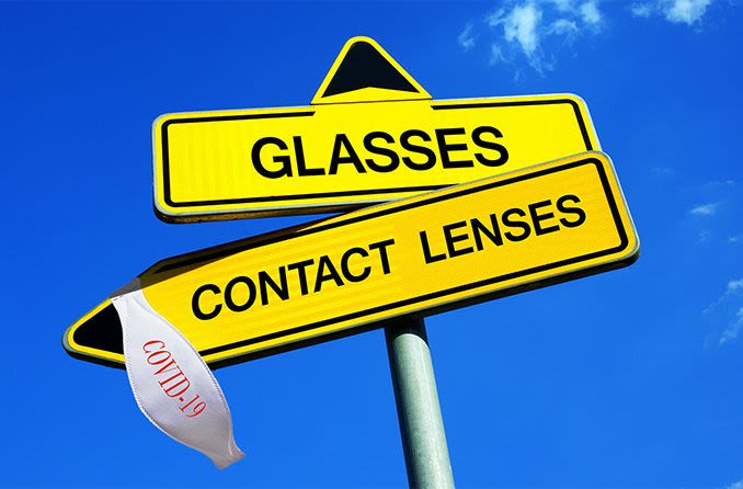 contacts vs glasses sign with covid-19 mask hanging from it