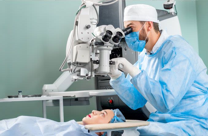 doctor performing laser cataract surgery on patient