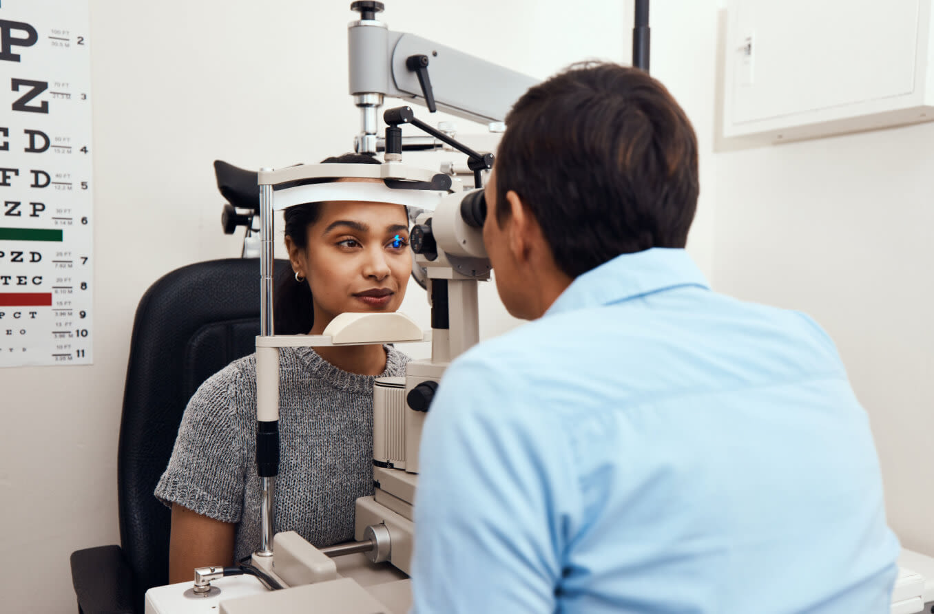 Elderly man receiving an eye exam