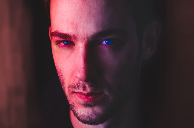 Man with dry, red irritated eyes