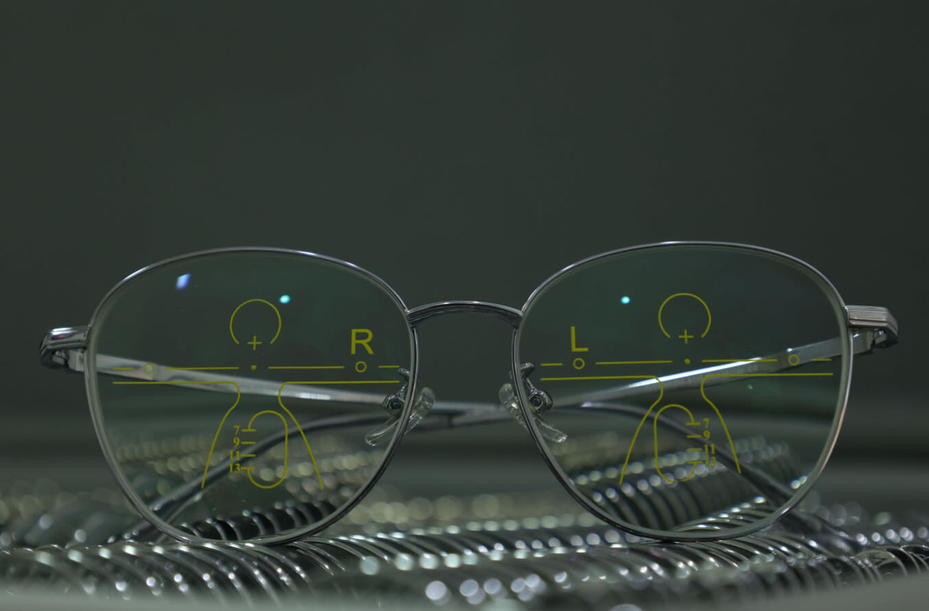 Close-up of glasses with progressive lenses.