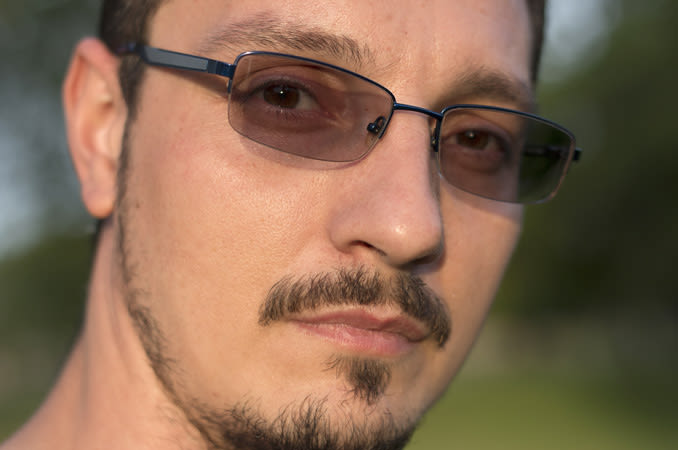 Man wearing photochromic lenses.