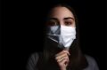 Woman wearing mask to prevent spread of coronavirus
