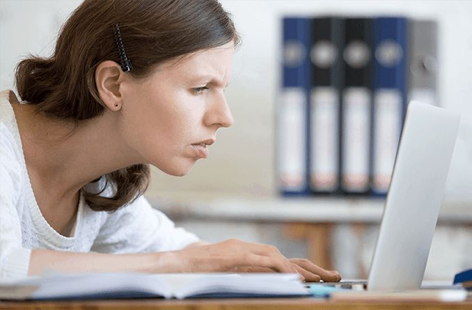 woman with bad posture at computer